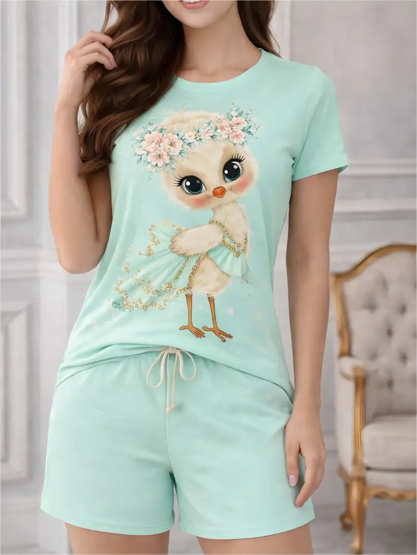 Pijama corta para mujer verde menta, camiseta con tierno pajarito floral y short liso.