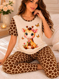 Pijama Jirafa Mariposas Flores para mujer, camiseta manga corta y pantalón largo a juego.