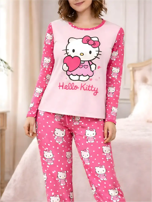Pijama larga para mujer, camiseta manga larga rosa con Hello Kitty y pantalón rosa a lunares con estampado de Hello Kitty.