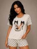 Pijama Tacón Lunares Beige para mujer, camiseta manga corta y short a juego.