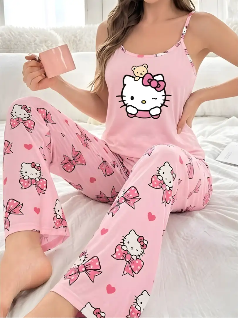 Pijama larga rosa de tiras para mujer, camiseta con gráfica de Hello Kitty y pantalón con moños y corazones.