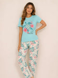 Pijama Tortuga Confiar y Fluir para mujer, camiseta manga corta y pantalón largo a juego.